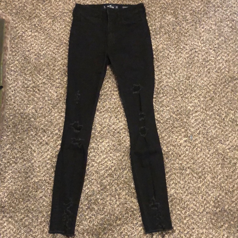 Black ripped skinny jeans.